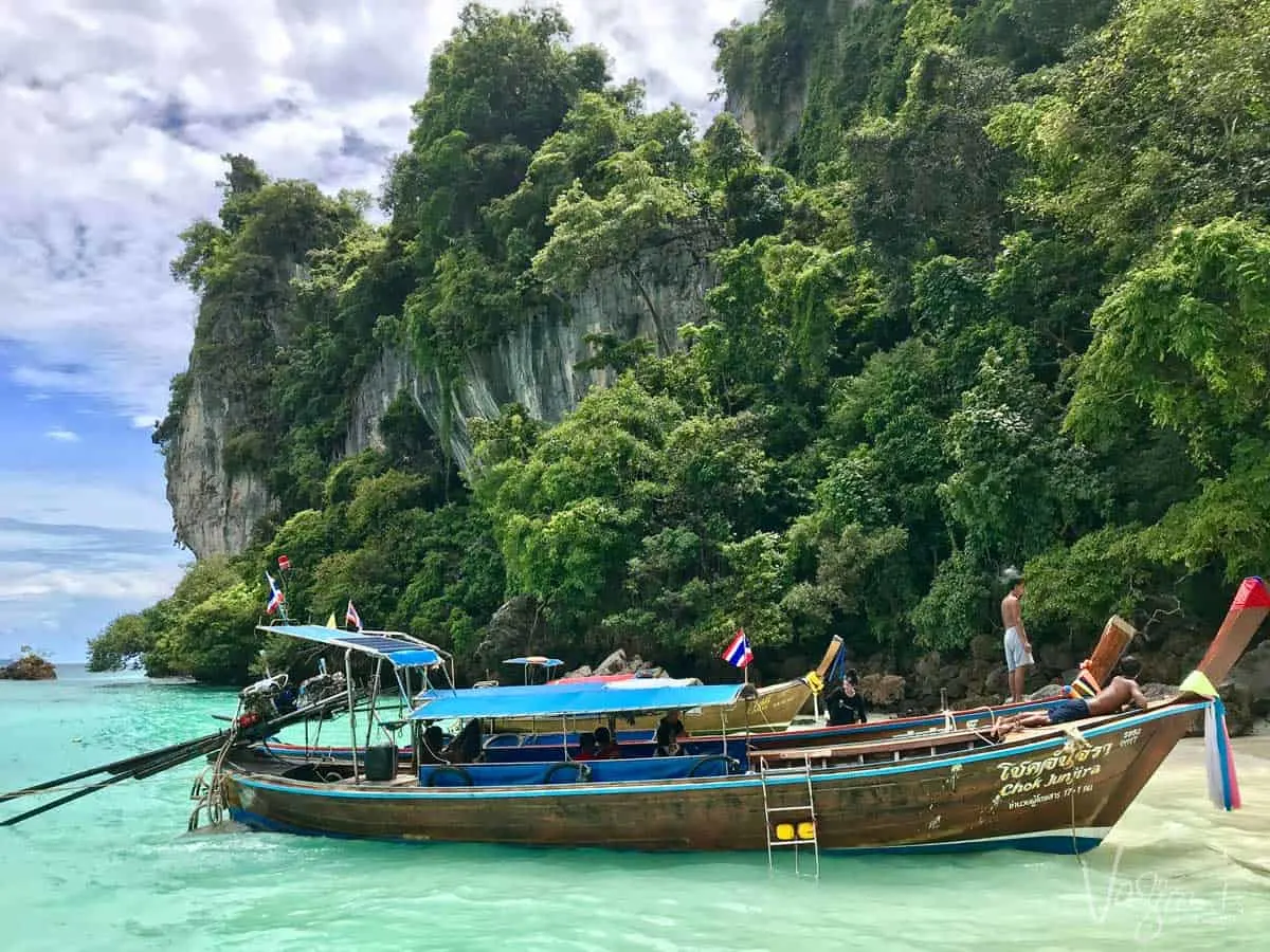 Typical Thai fishing boat in clear blue water. 