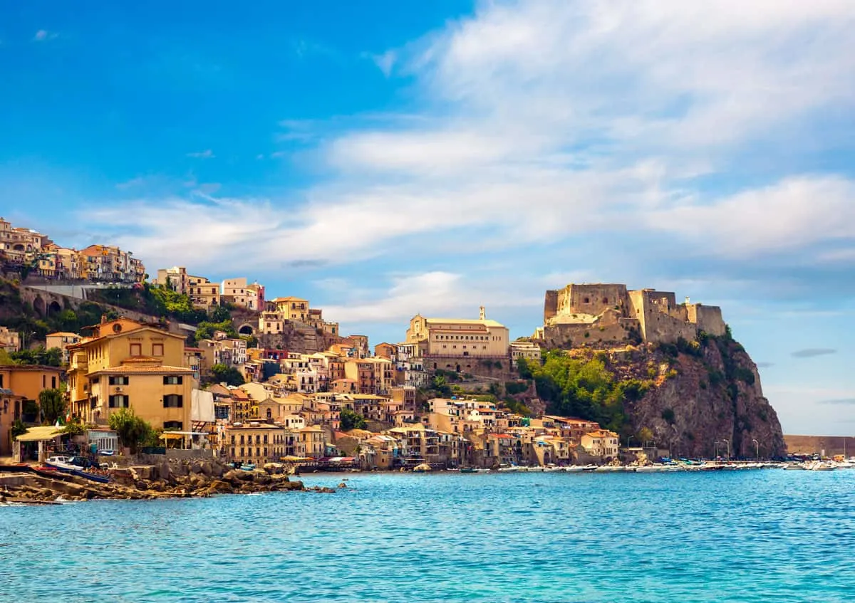 Looking over the sea towards the city and castle of Calabria in Sicily.