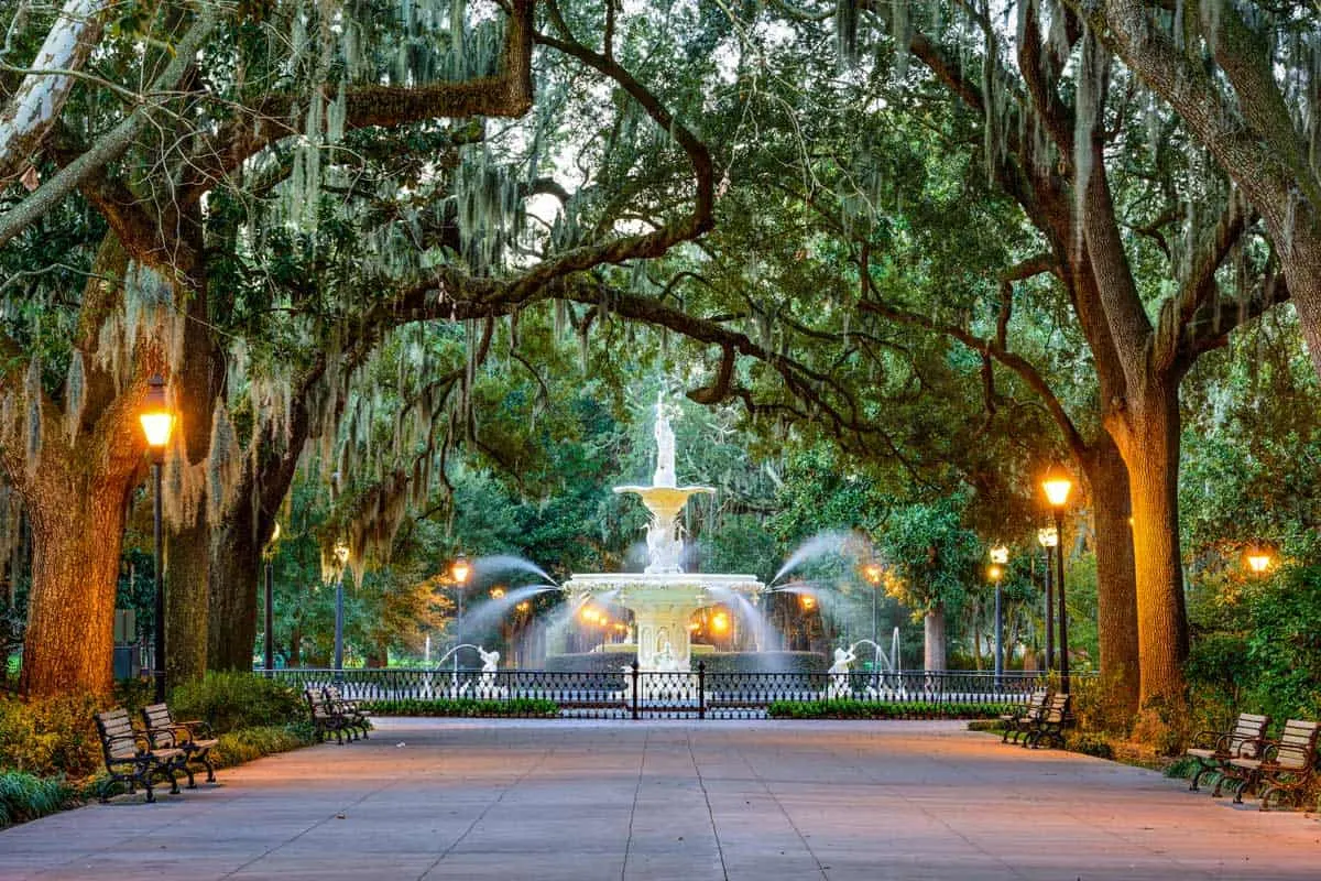 Fountain at the ned of a tree lined boulevard in Forsyth Park Savannah.
