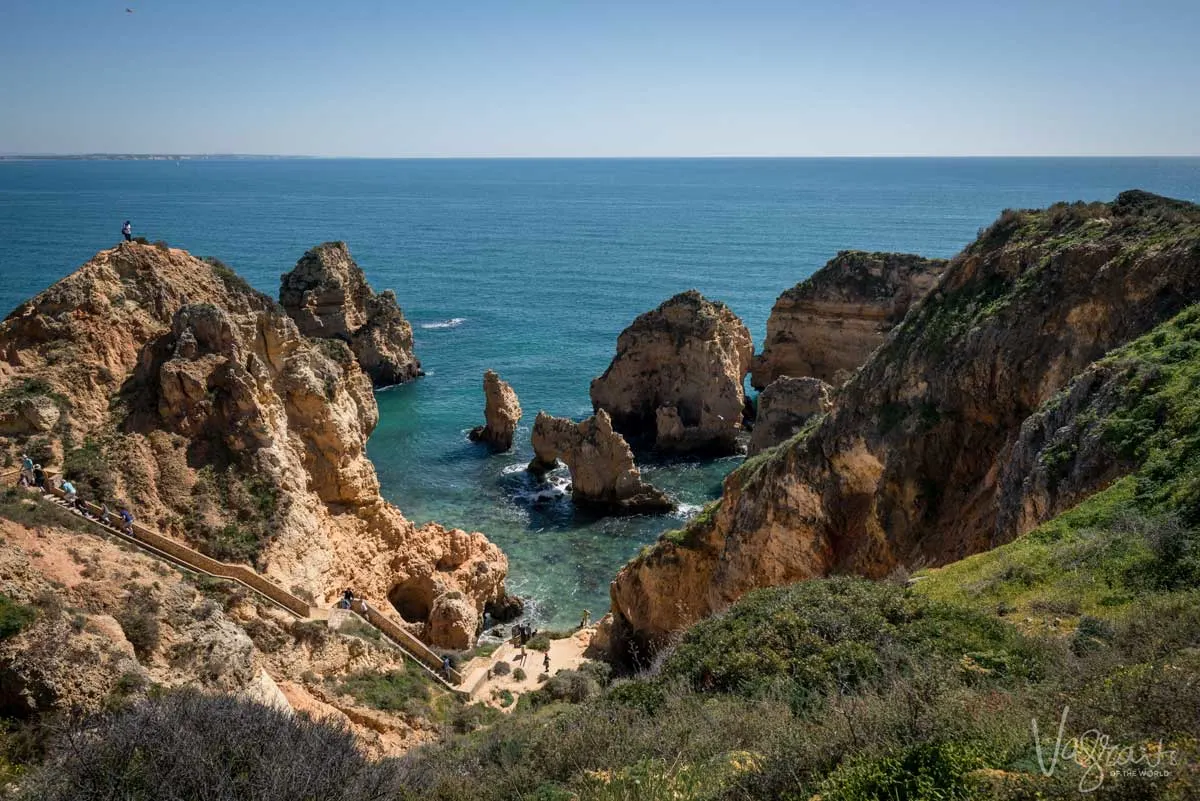 The yellow cliffs and sea caves of Lagos in the Algarve in Portugal.