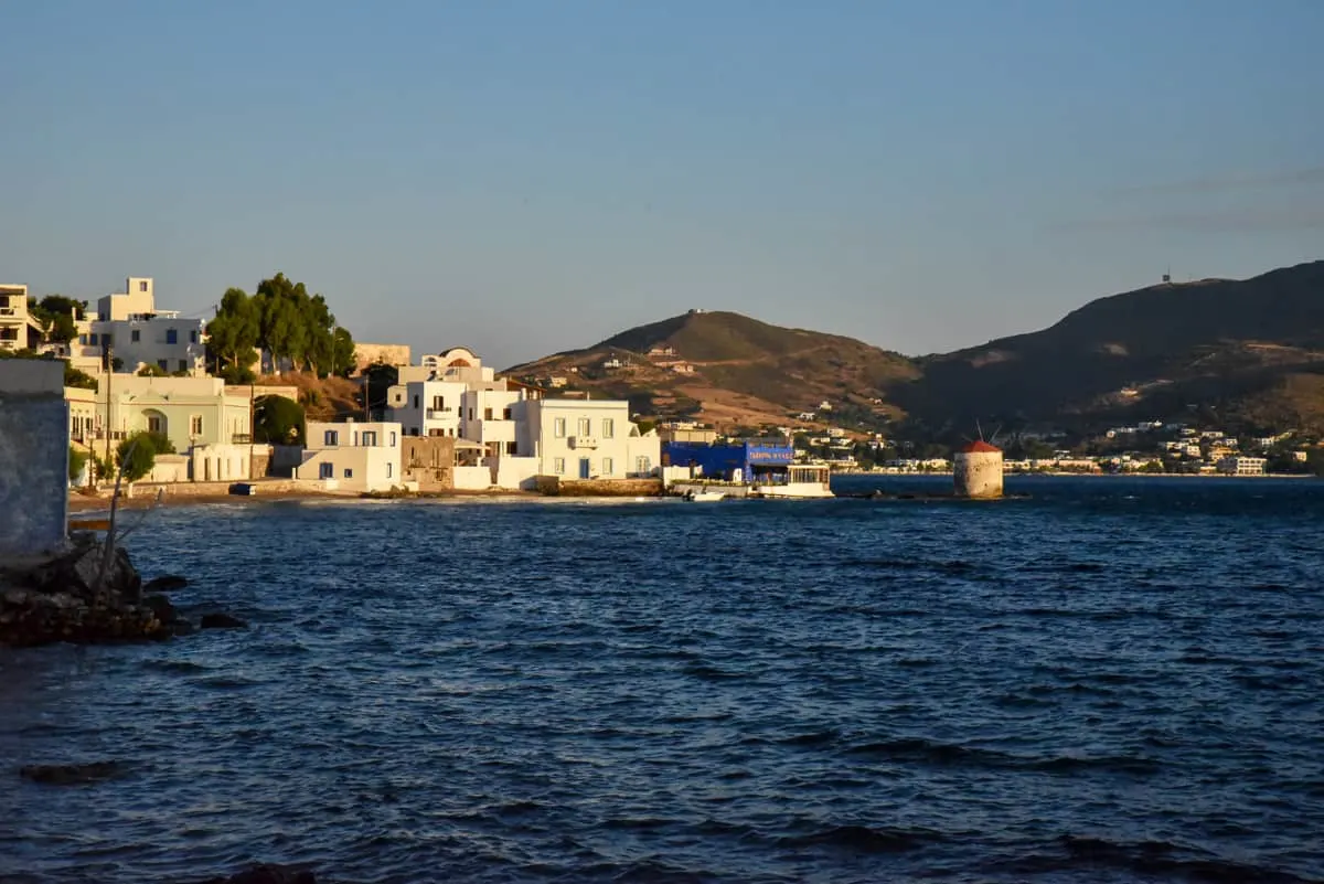 Views across the water to Leros Island village at sunset.