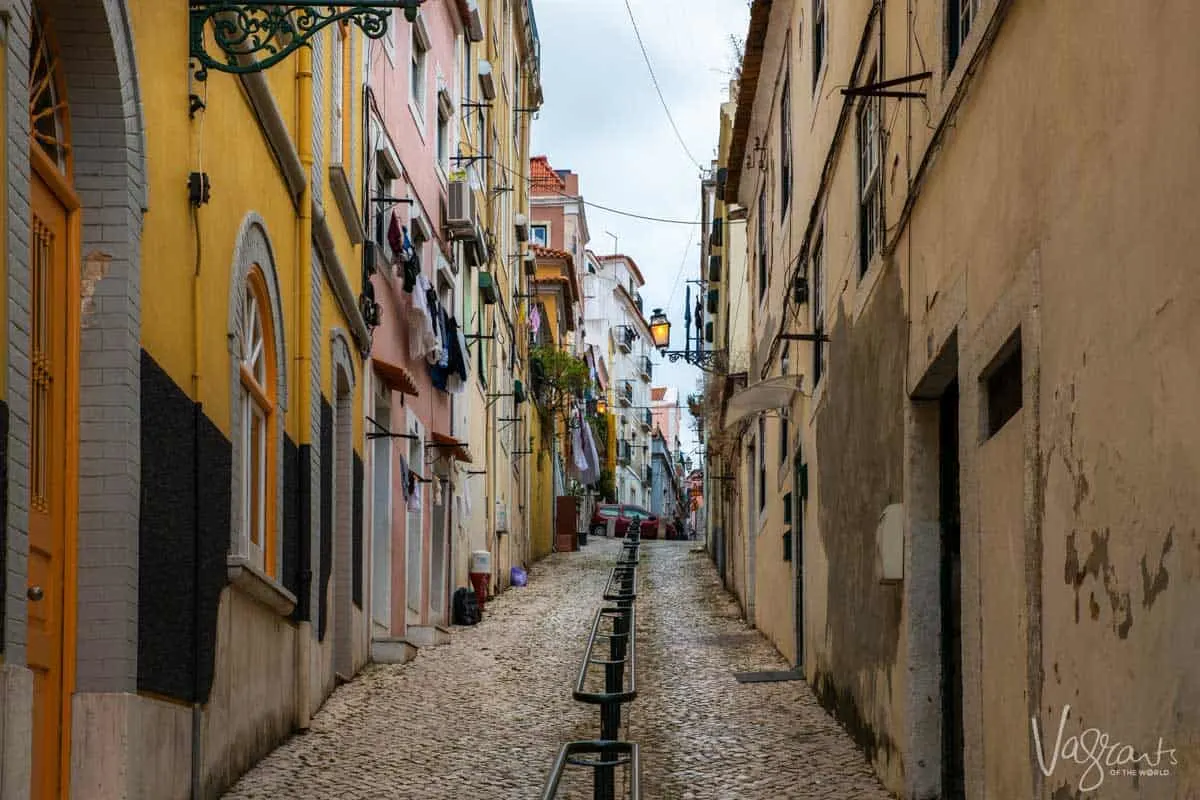 Typical cobblestone side street in Lisbon Portugal. 