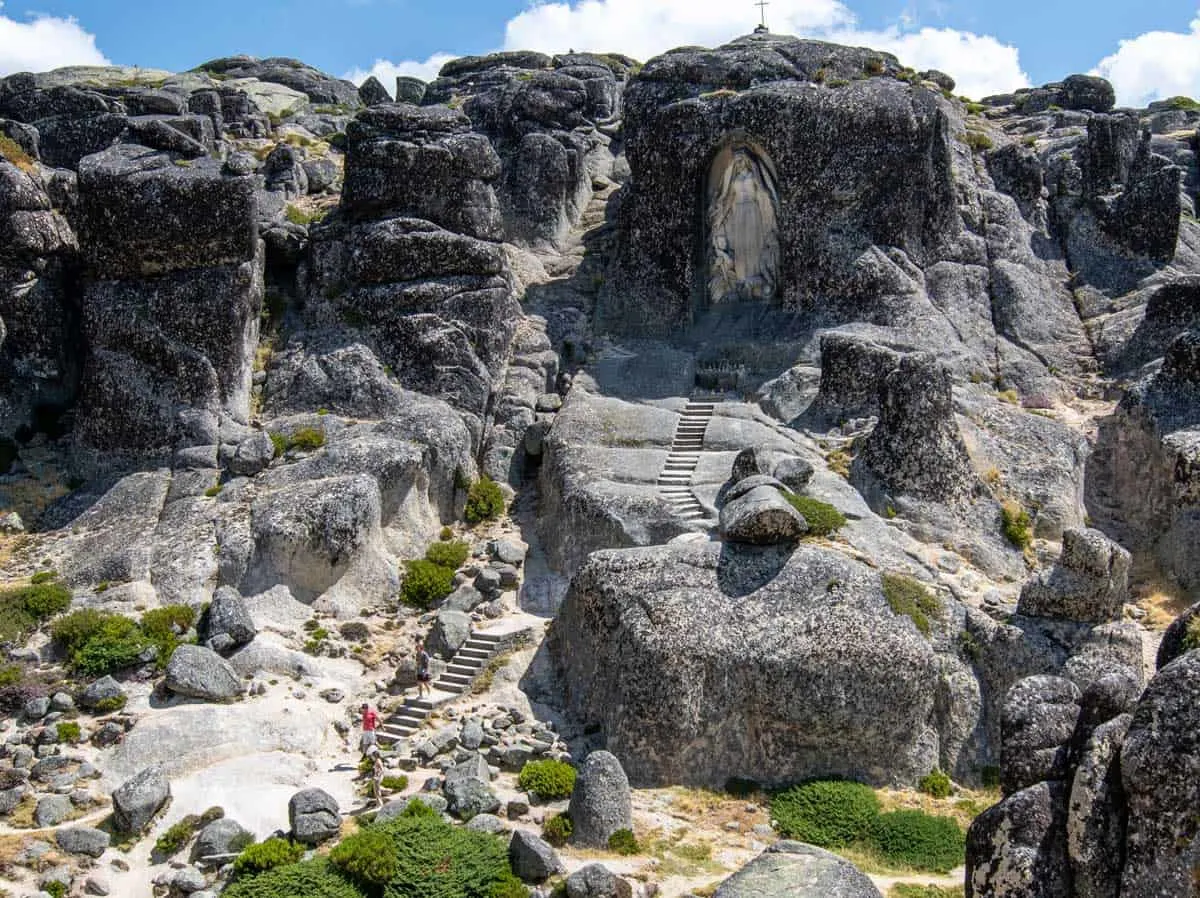 Giant rock carved statue of Mary in the rocks at the top of Serra da Estrela Portugal. 