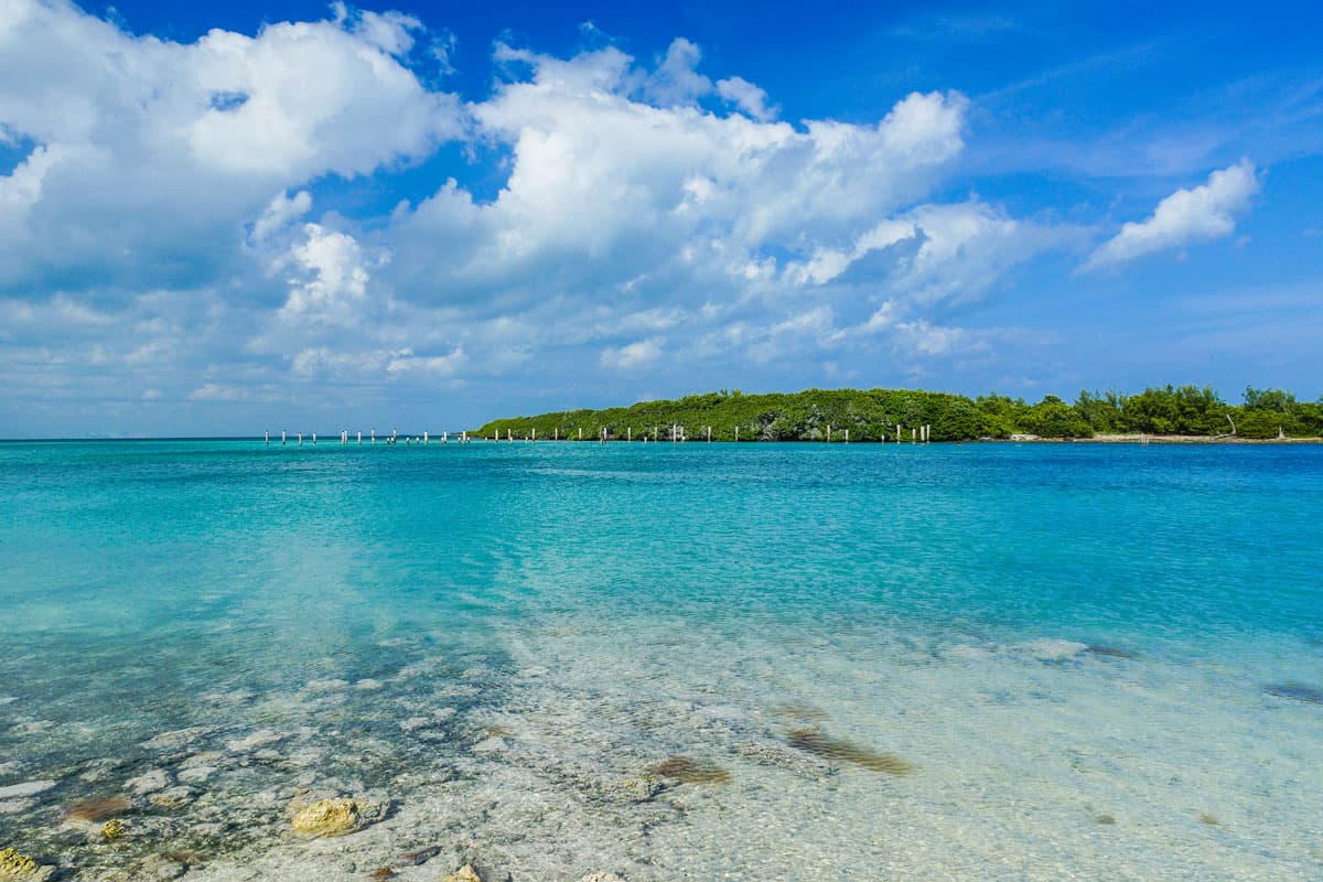 Clouds and blue sky over the clear waters of Boca Chica Key in Biscayne national park.