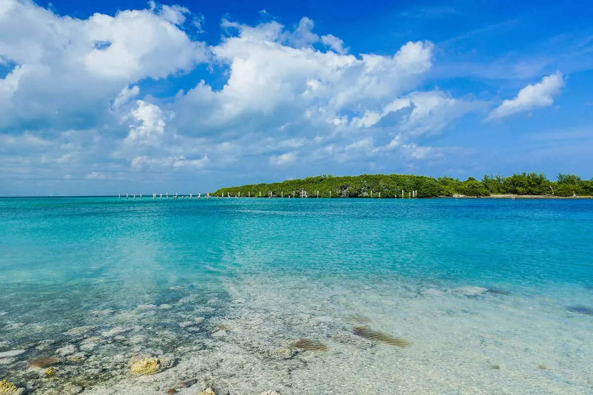 Clouds and blue sky over the clear waters of Boca Chica Key in Biscayne national park.