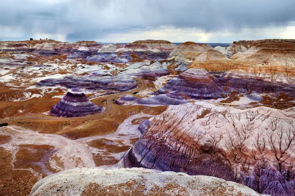 Colourful purple and red sandstone landscape of eroded rocks in the Painted Desert. 