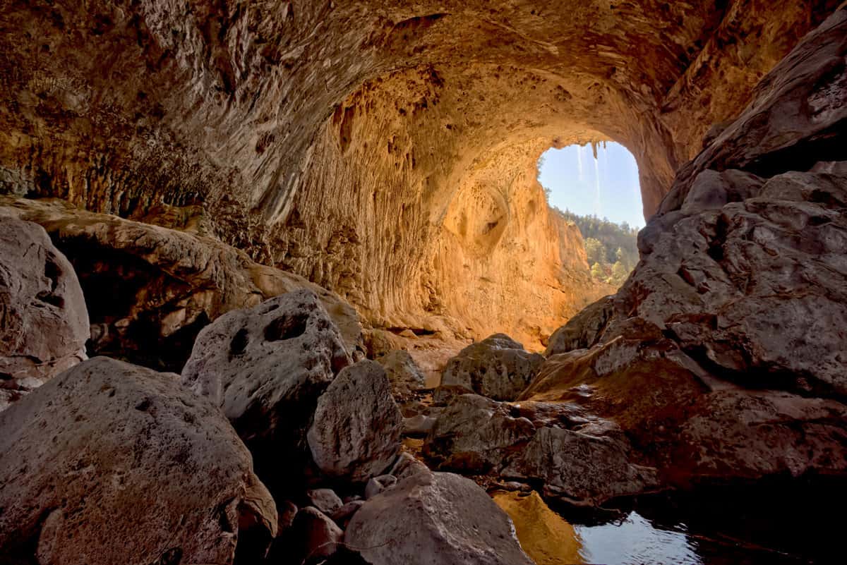 Inside the yellow walled cave, looking out, under the Tonto Natural bridge. 