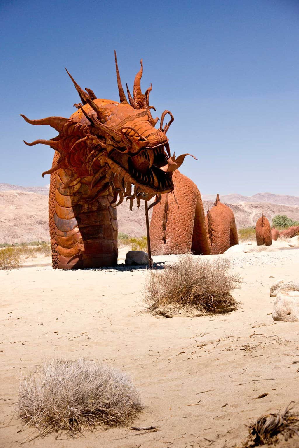 Giant metal serpent sculpture in the desert in Borrego Springs Galleta Estate.