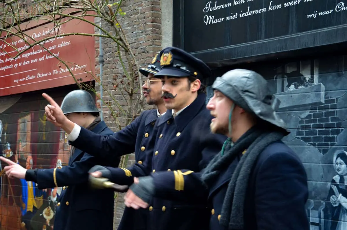 Men in costume dressed as Dickens period policemen in the streets of Deventer in the Netherlands. 