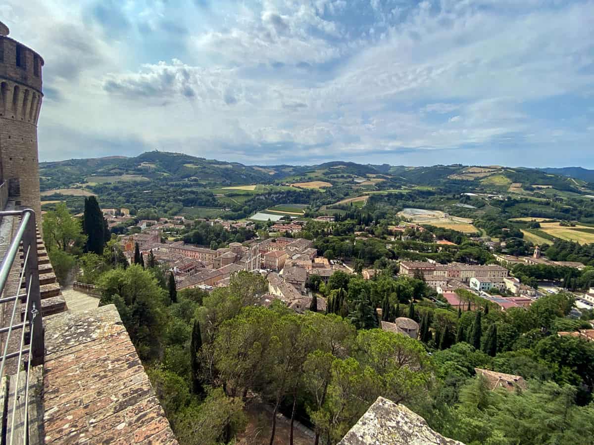 The lush green Italian countryside with medieval villages view from the top of a castle in Brisighella.