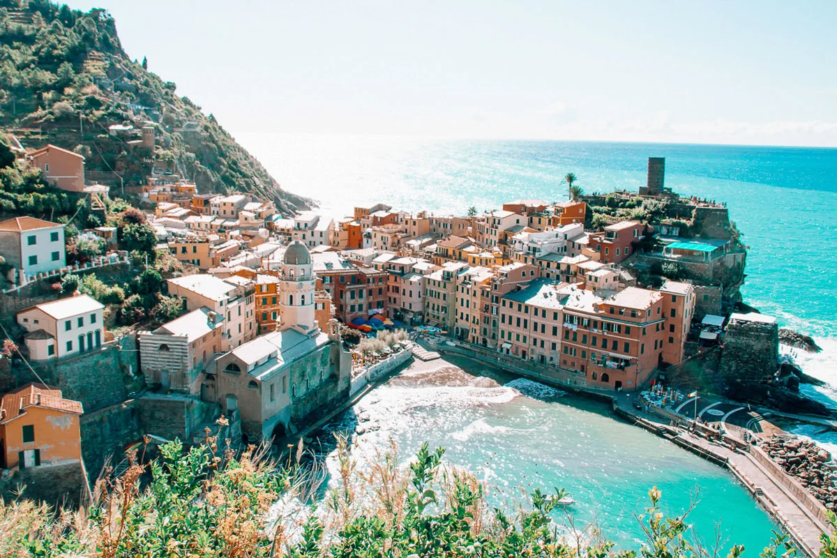 Overlooking the bay surrounded with the colourful cliff side village of Vernazza in Cinque Terre. 