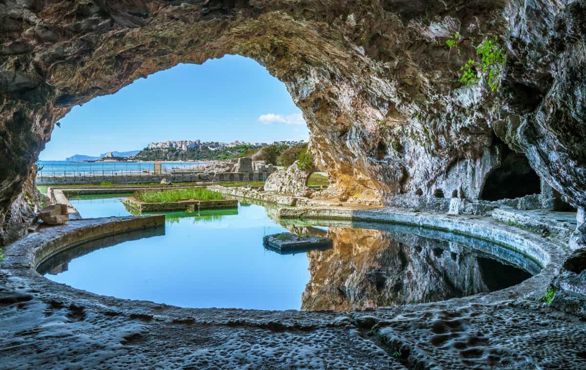 Tiberio's Villa, roman ruins near Sperlonga. A mirrored pond inside a cave looking out over the sea.