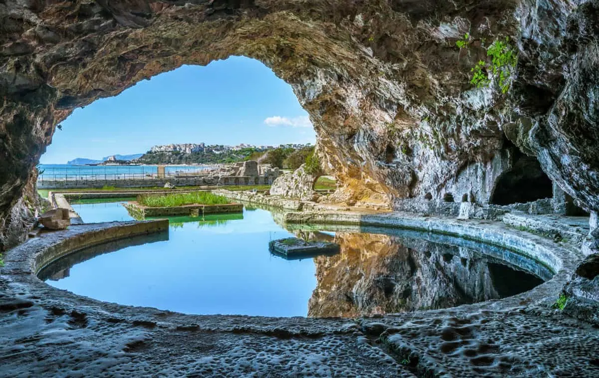 Tiberio's Villa, roman ruins near Sperlonga. A mirrored pond inside a cave looking out over the sea.