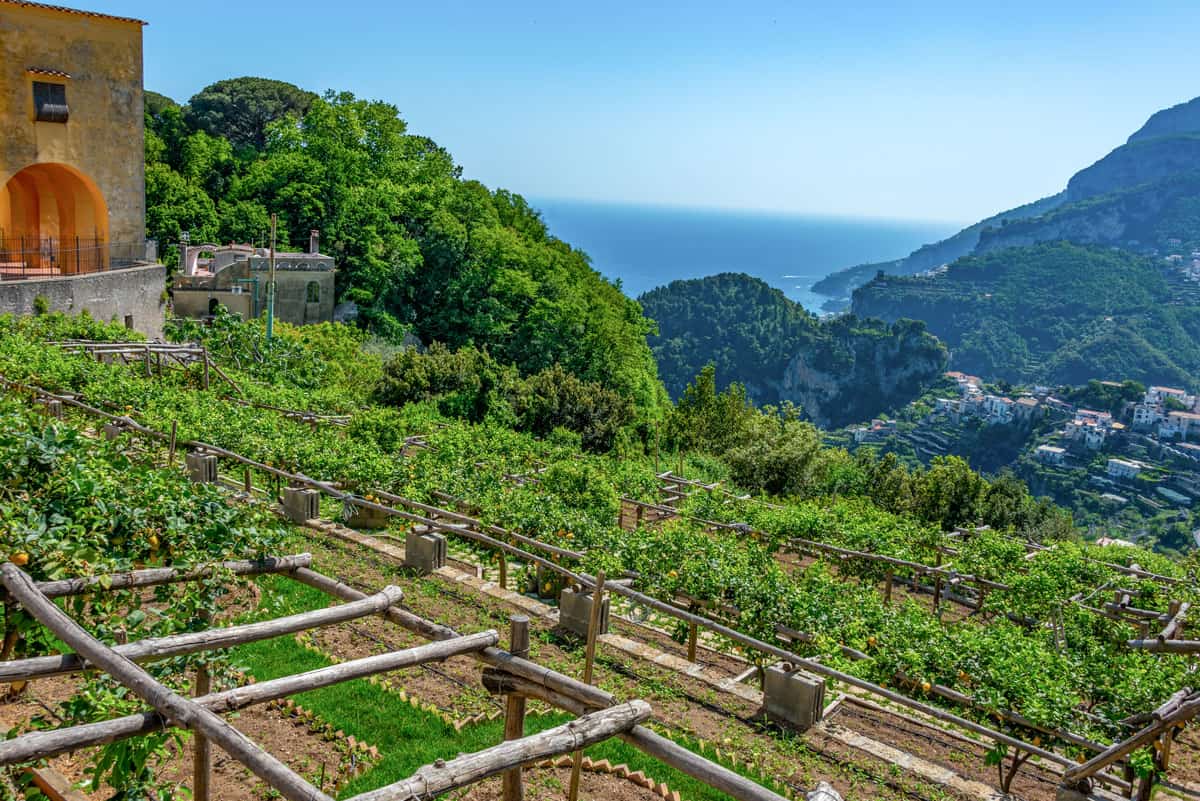 Views over green valleys with the blue sea in the distance on the Amalfi Coast.