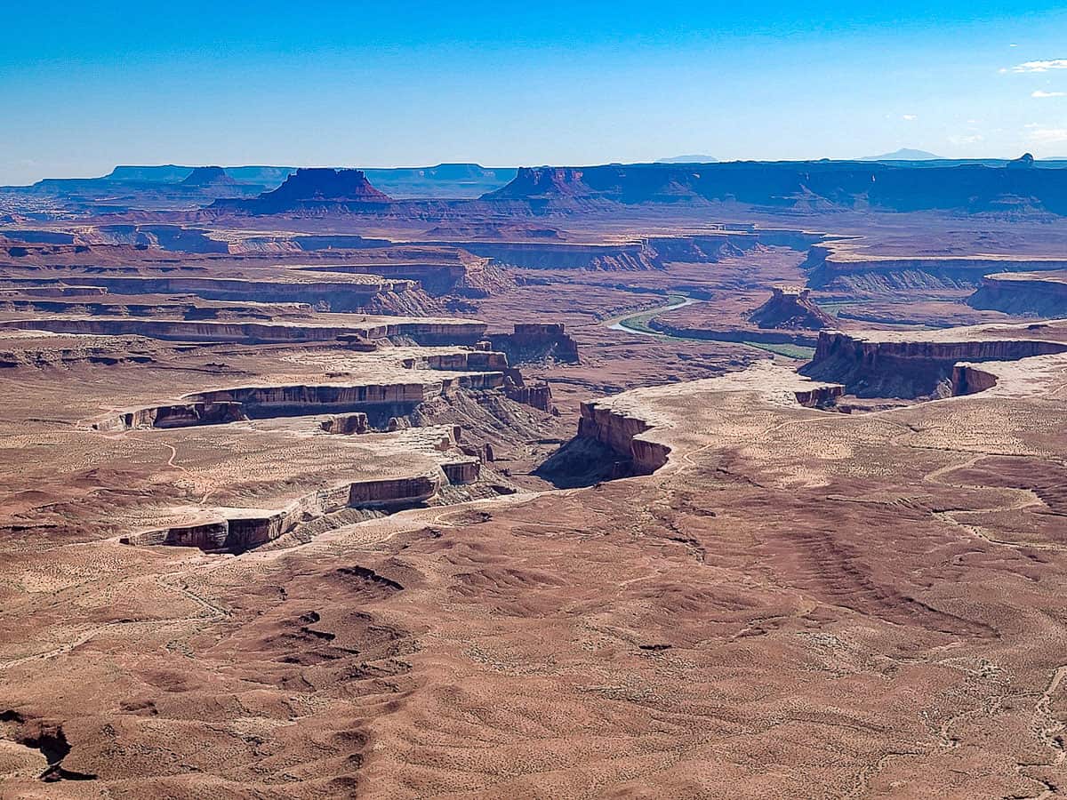 Sweeping views over arid, rocky landscapes in Canyonlands national park. 