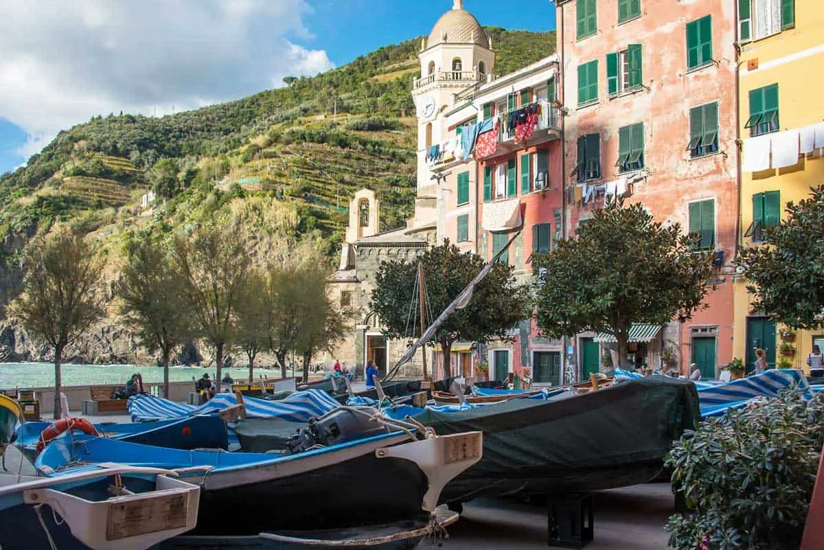 The colourful houses of Cinque Terre with fishing boats in the foreground. 