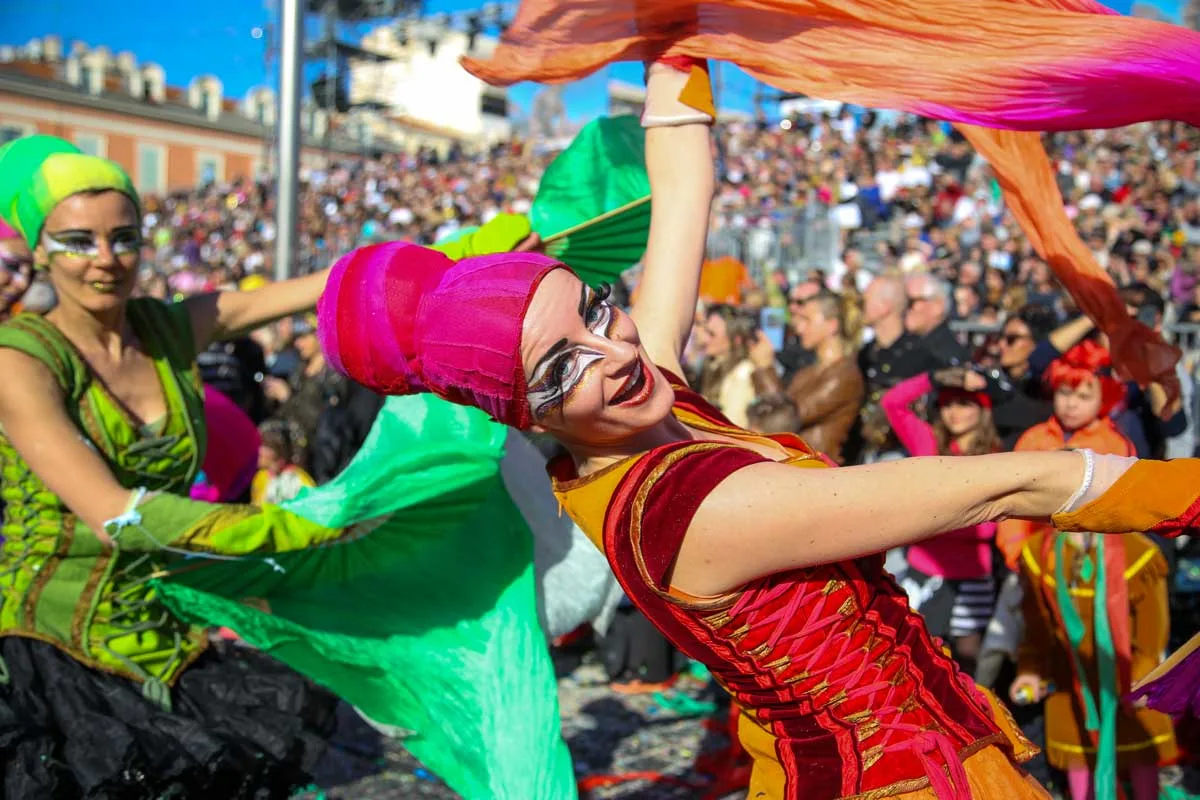 Performers in colourful costumes in the Nice carnival parade in February. 