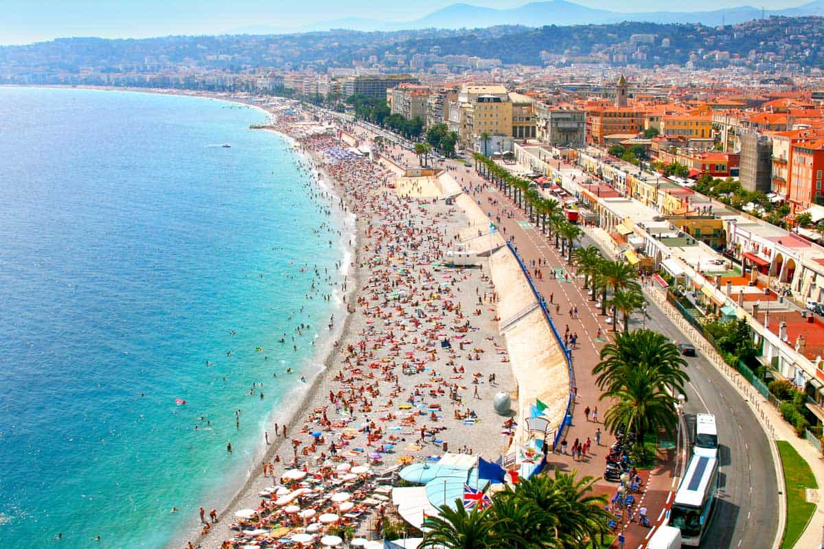 Aerial view of the crowded beach in Nice France in summer. 