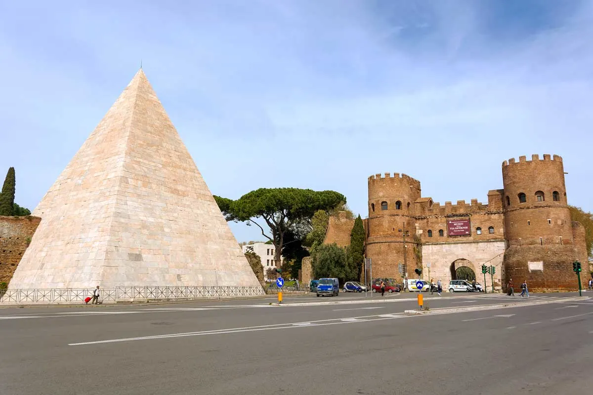 A pyramid and old Roman gate in the centre of Rome. 