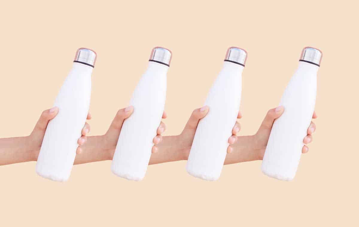 https://vagrantsoftheworld.com/wp-content/uploads/2023/06/Reusable-water-bottles-in-a-female-hand.jpg