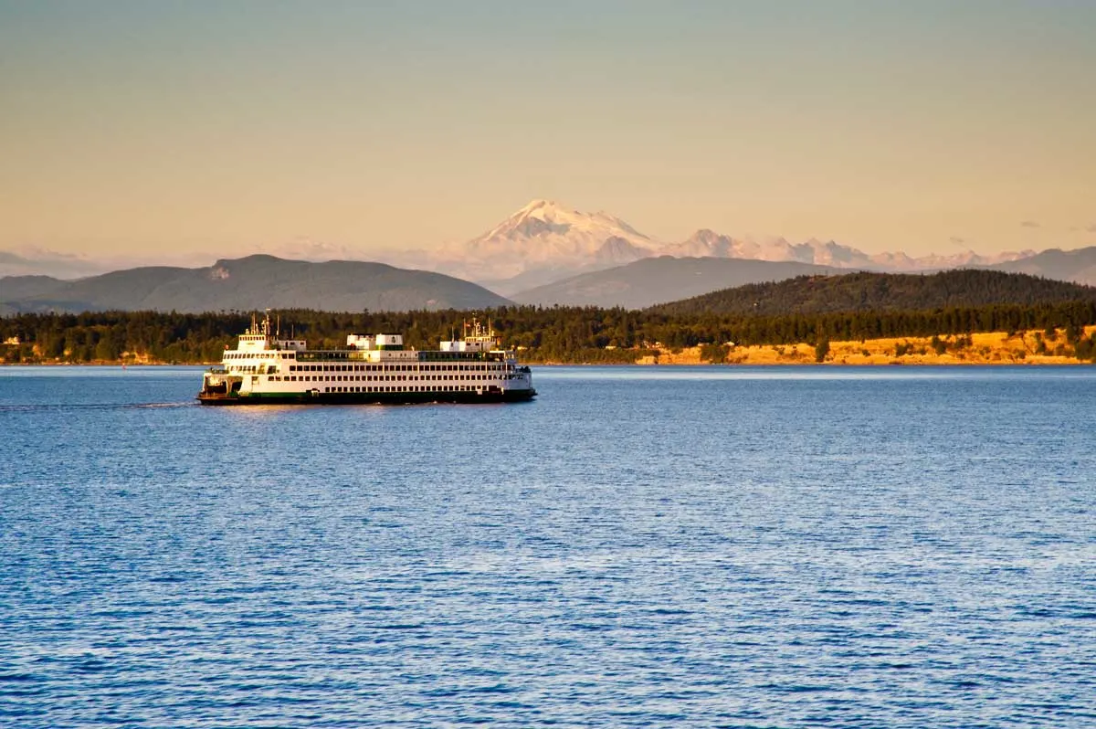 A ferry crosses the Puget sound at sunset.