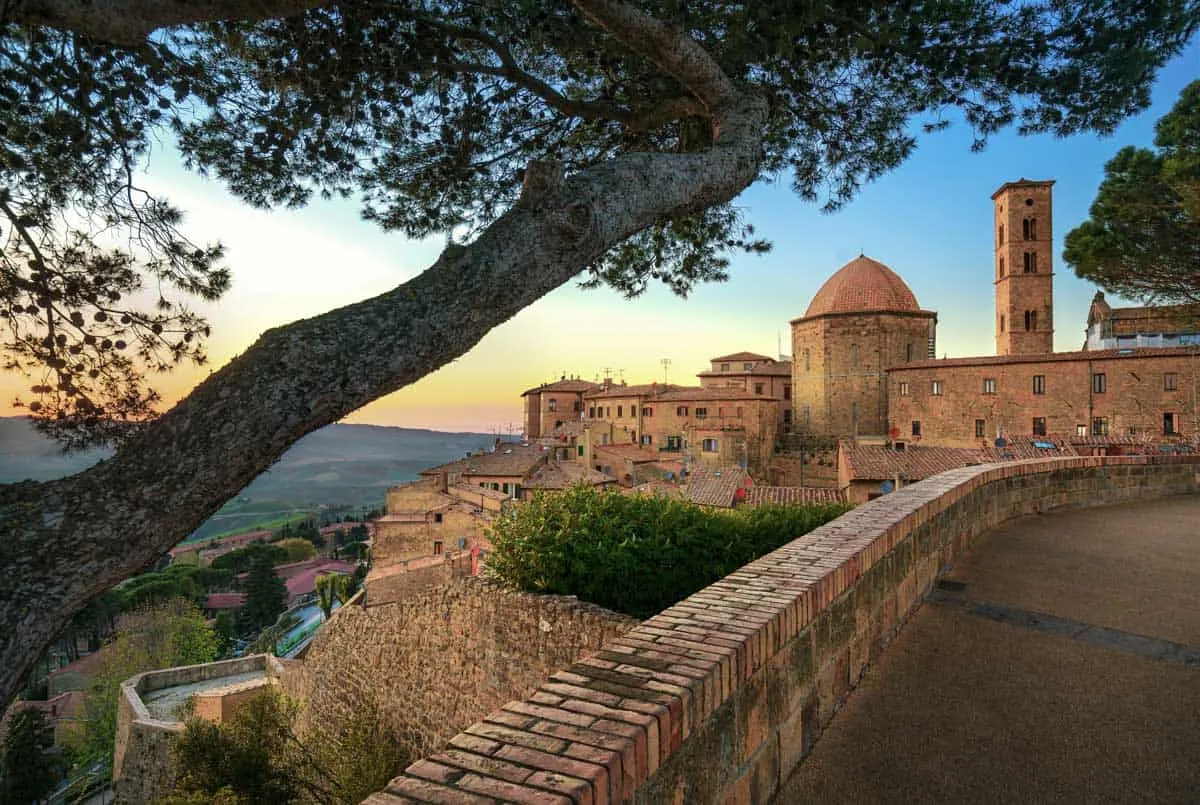 Skyline of the medieval town of Volterra at sunset. 