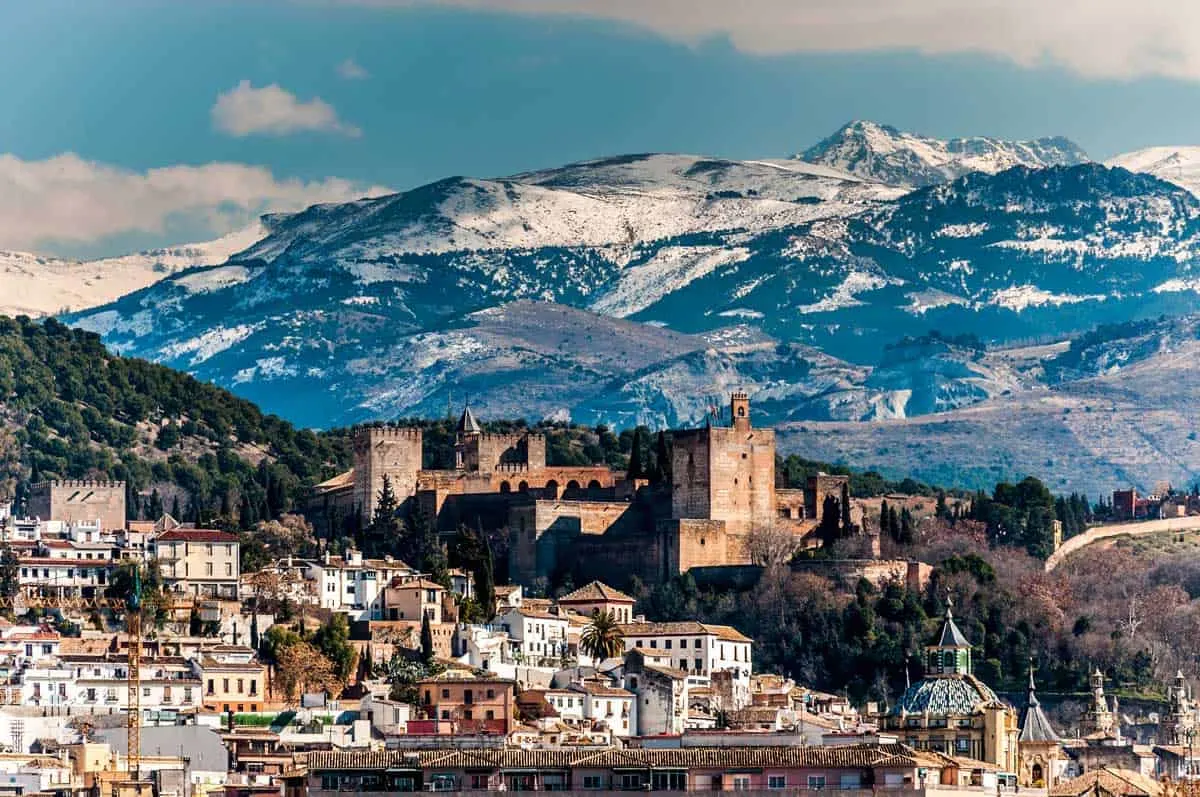 City of Granada with the snow capped Sierra Nevada in the distance. 