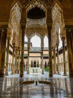Ornate Islamic architecture inside the Alhambra in Granada Spain.