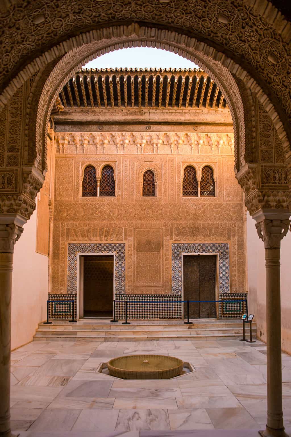 Ornate islamic designs inside the Alhambra in Granada Spain. 