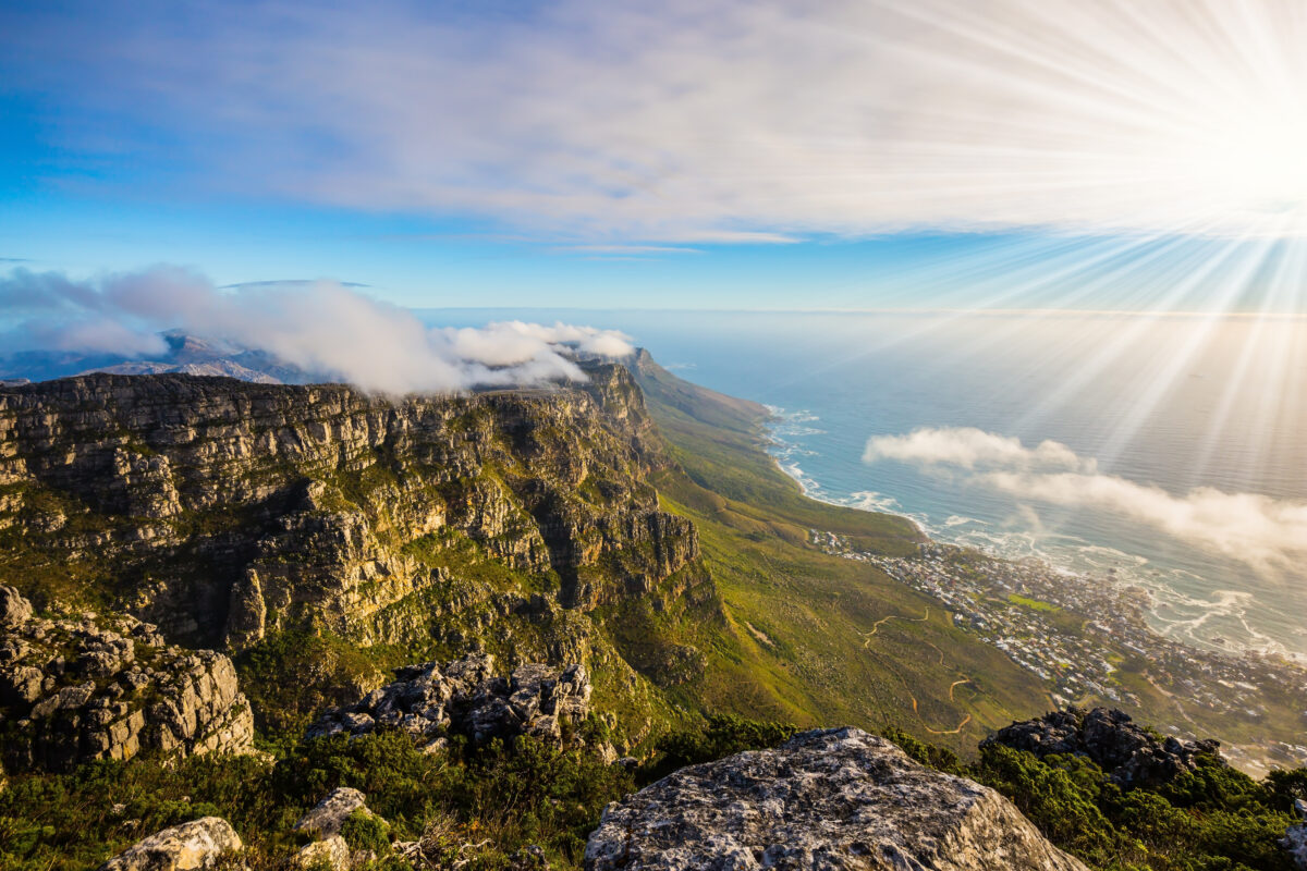 View of the sunset in the Atlantic Ocean from the top of Table Mountain in South Africa