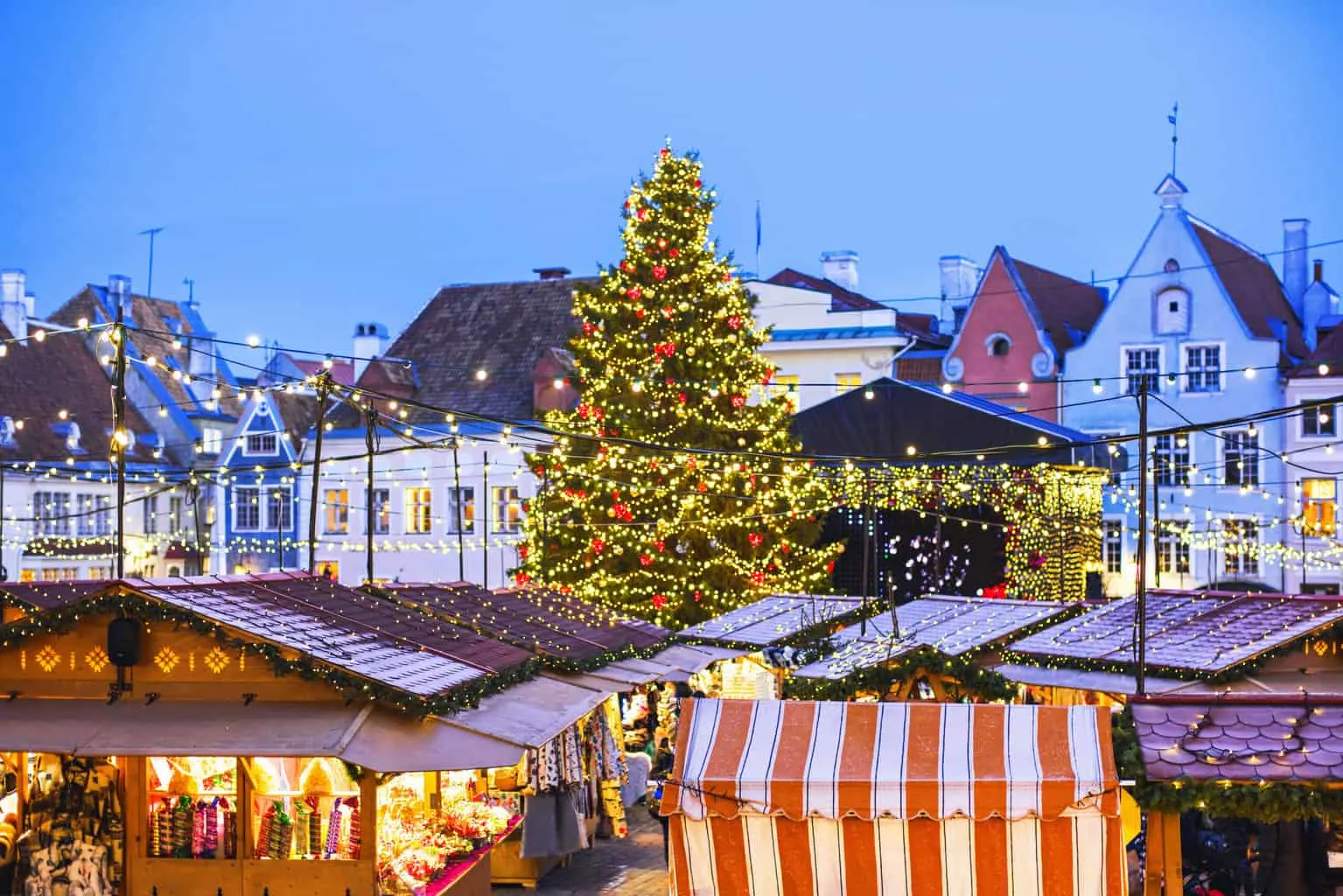 A German Christmas market lit up at night in winter
