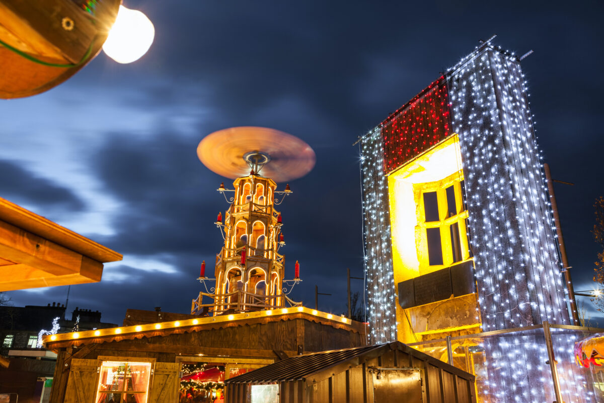 Christmas market at night in Galway, Ireland. Lights and decorations on city buildings