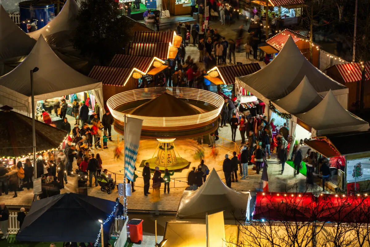 Christmas Market in Ireland. View of shops and people walking through the markets