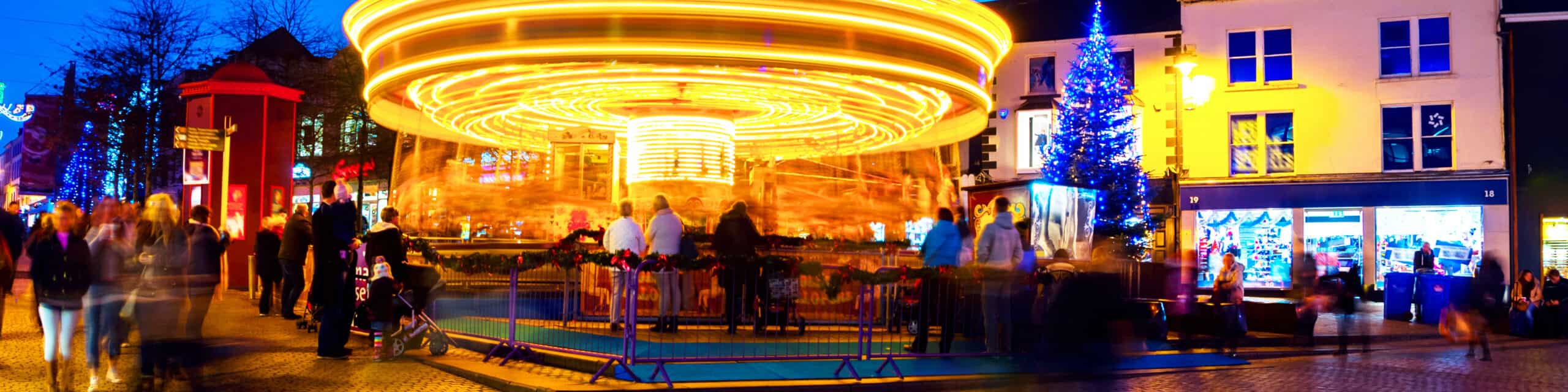 A lit merry-go-round at the Winterval Christmas festival in Waterford, Ireland