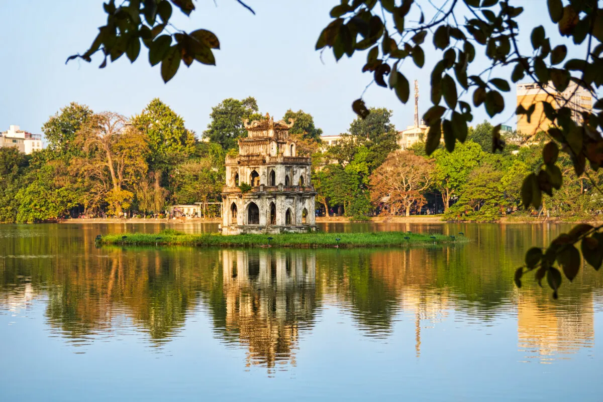 View of Tortoise Tower in Hoan Kiem Lake, Hanoi on a sunny day in Vietnam