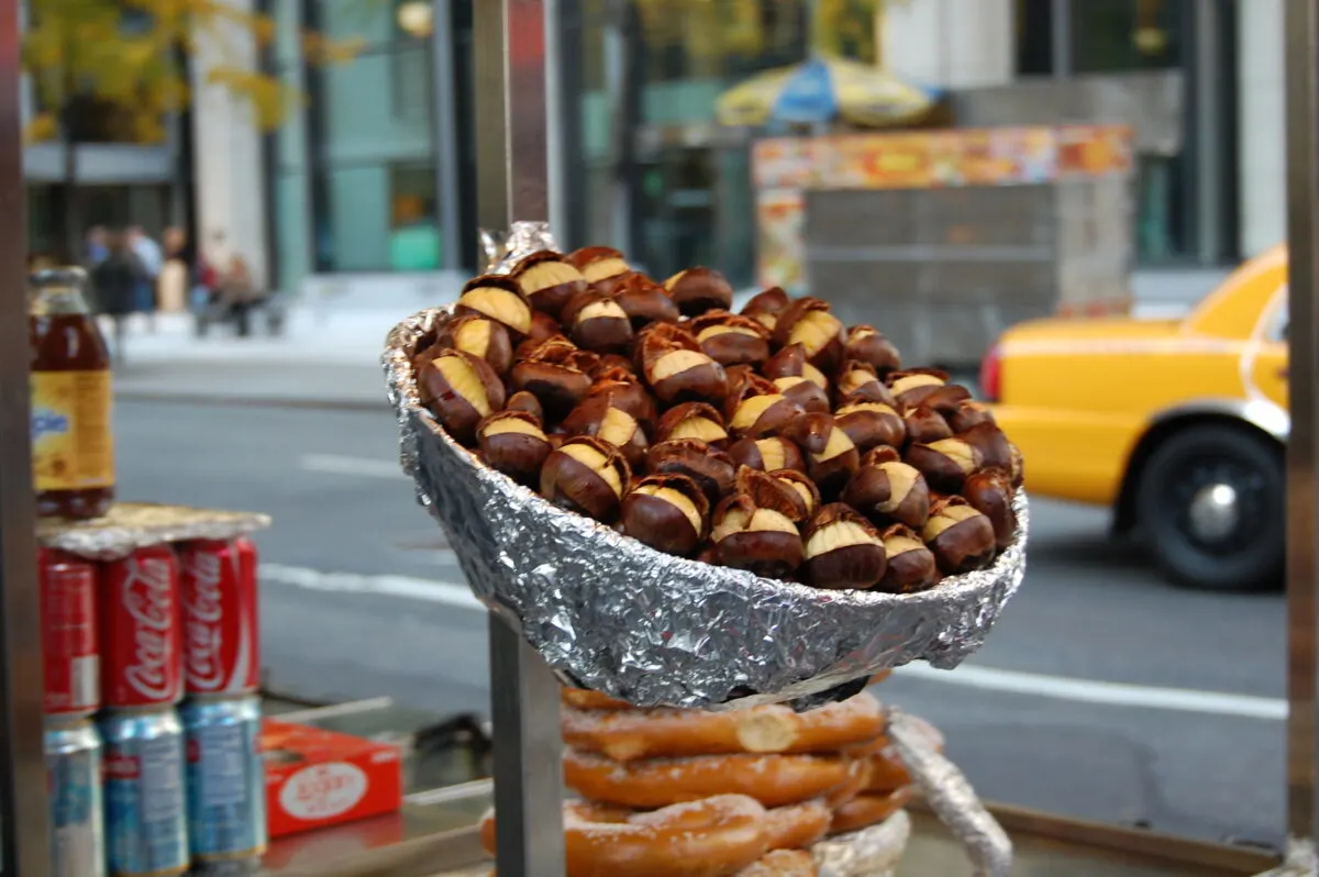 Hot Chestnuts being sold on the street with a pretzel-wrapped bottom  on New York City Street