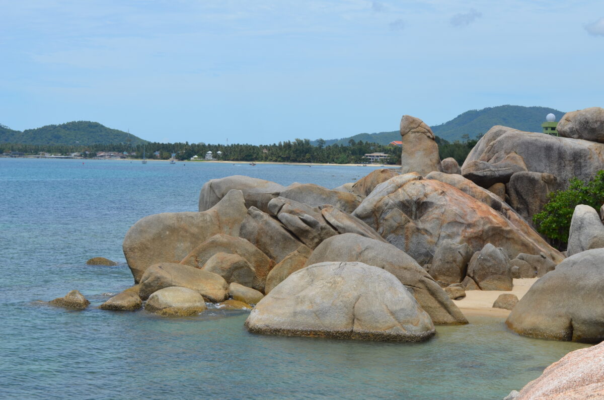 Hin Ta & Hin Ya Rocks on a sunny day surrounded by clean waters