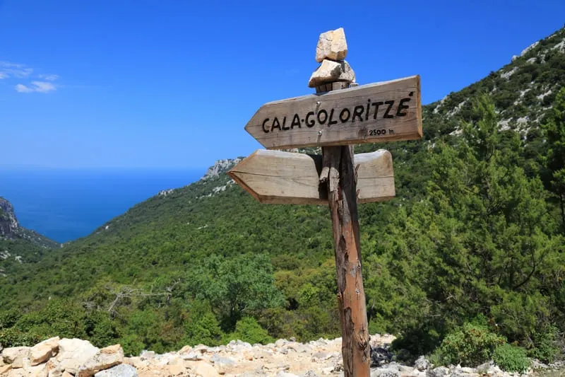 Cala Goloritze hiking trail sign in Sardinia