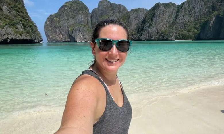 Woman taking selfie on the beach