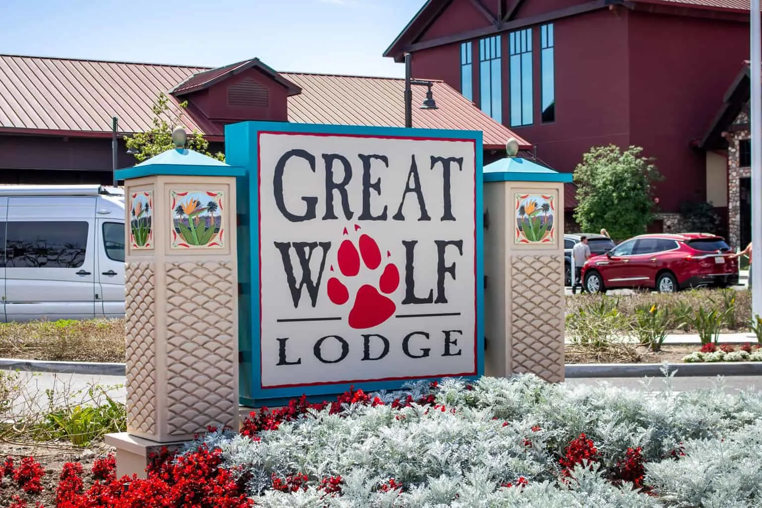 The Great Wolf Lodge entrance sign on stone pillars outside the resort in Scotrun, Pennsylvania
