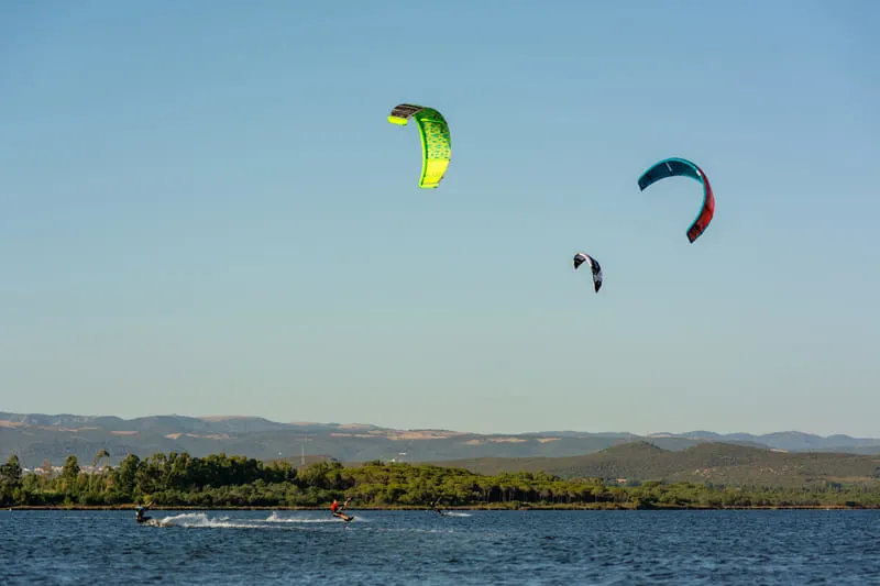 Kitesurfers riding near Punta Trettu, near Cagliari, in Sardinia