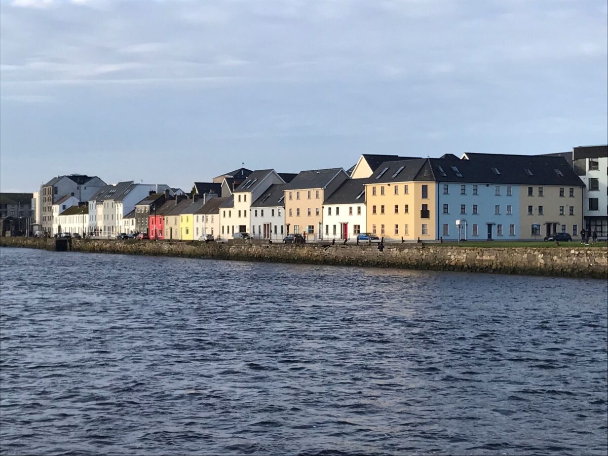 view of buildings of Galway City, from the water. Galway, Ireland. Galway experiences