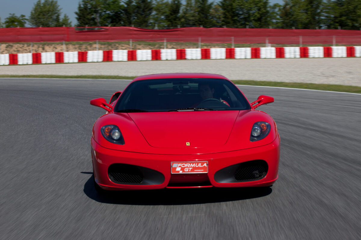 Ferrari exotic car on race track 
