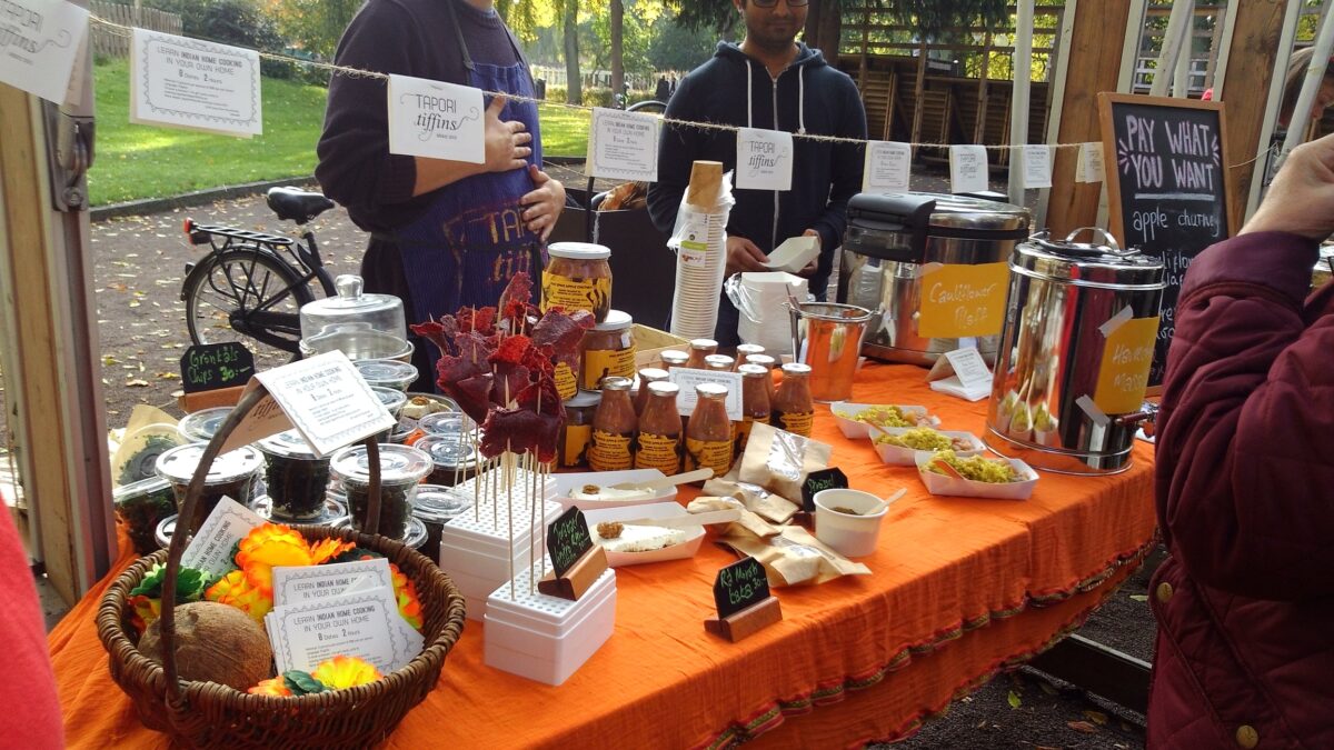 table set up selling goods at Sacramento harvest festival 