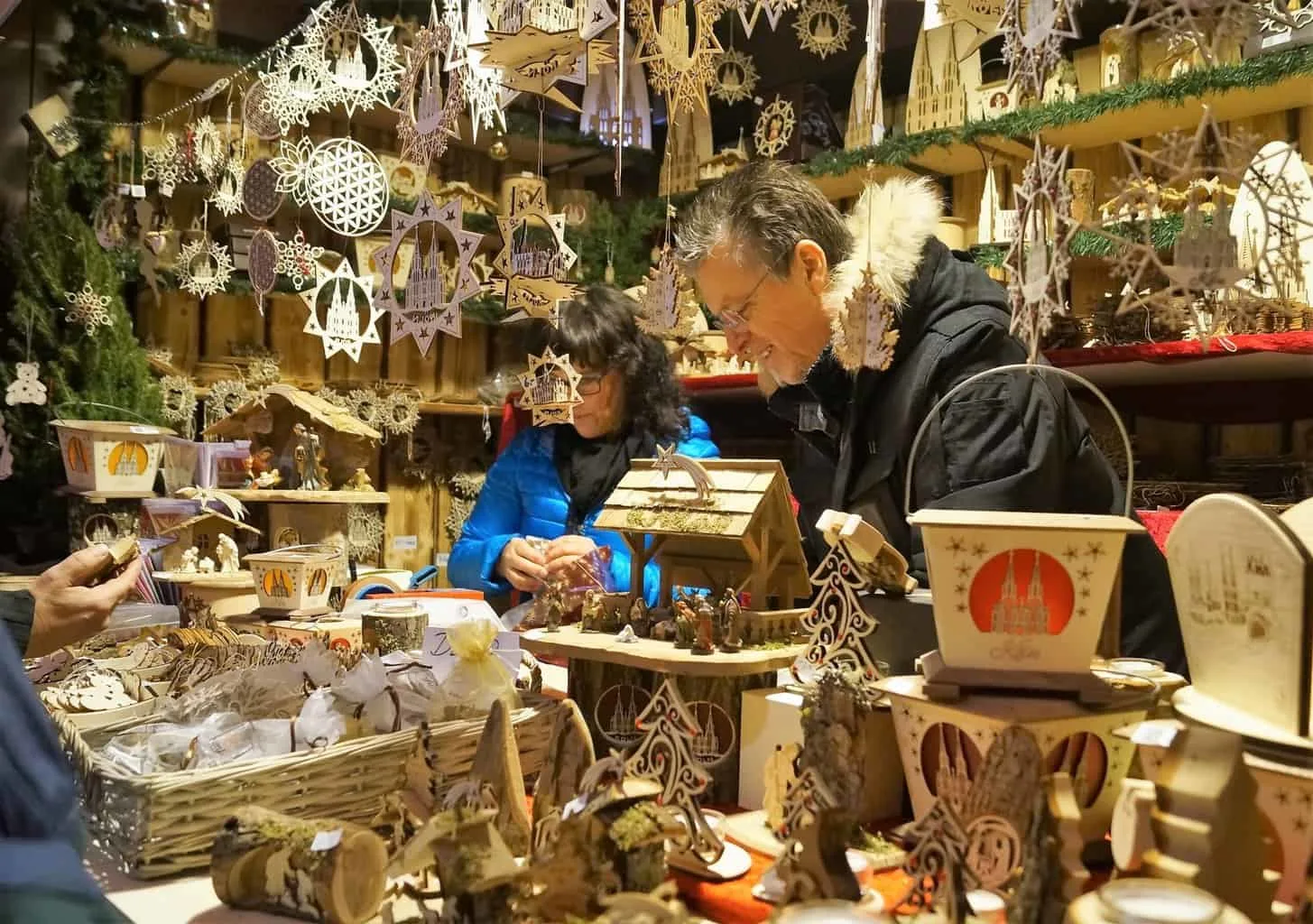Wooden stalls lit up at one of the best Christmas markets in Europe
