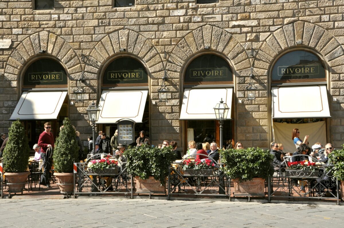 The famous Rivoire Restaurant in Florence. People sitting outside on the patio at tables