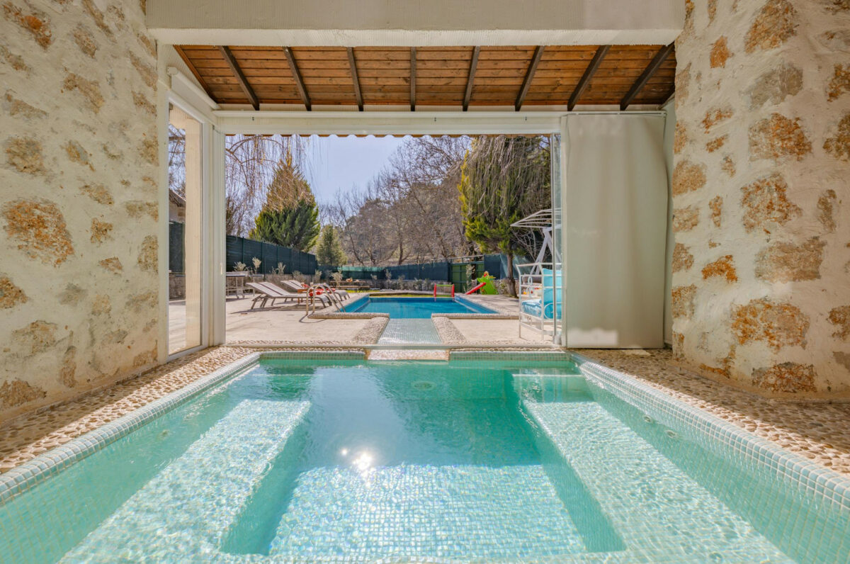 beautiful luxury pool in outdoor cabana