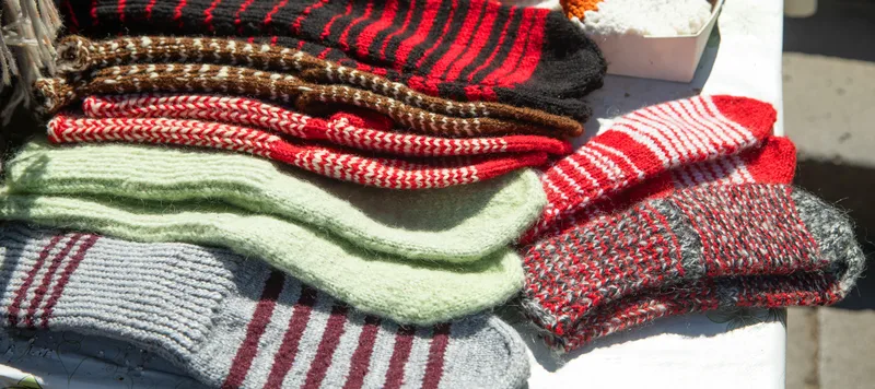 wool socks on a table for sale