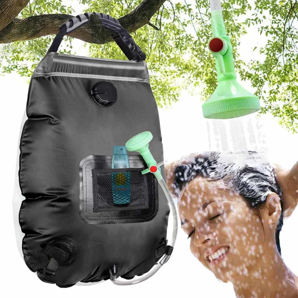 Image of KIPIDA Solar Shower Bag in black with woman washing her hair for eco-sustainable travel products