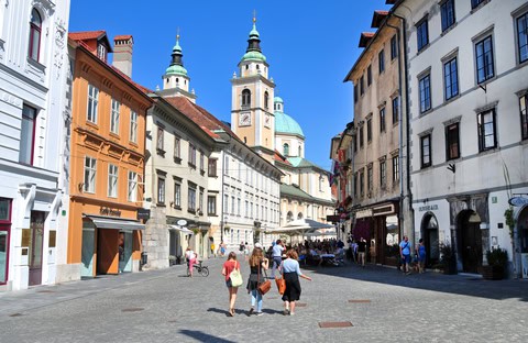 people walking down the street in Ljubljana Slovenia in spring
